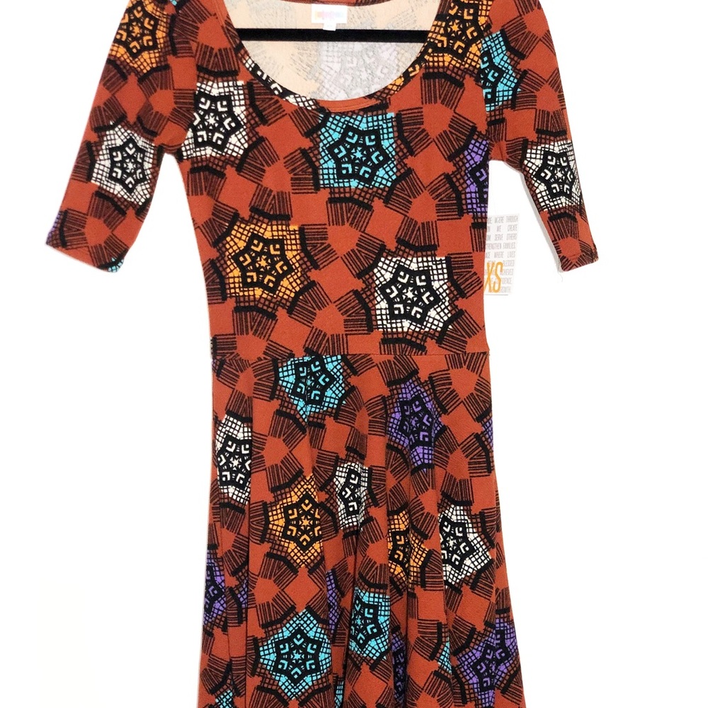 LuLaRoe Nicole Dress NWT
2nd Pic Size Chart
